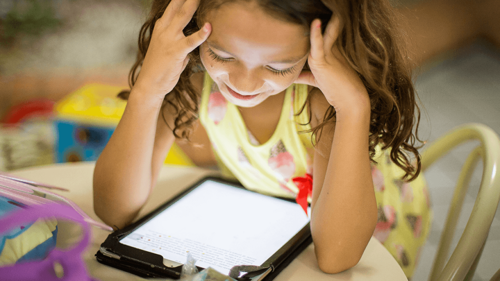 Kid watching a tablet
