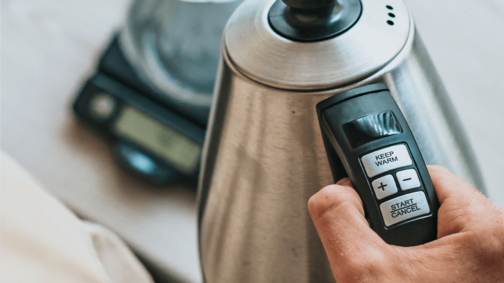 Holding an Electric Kettle